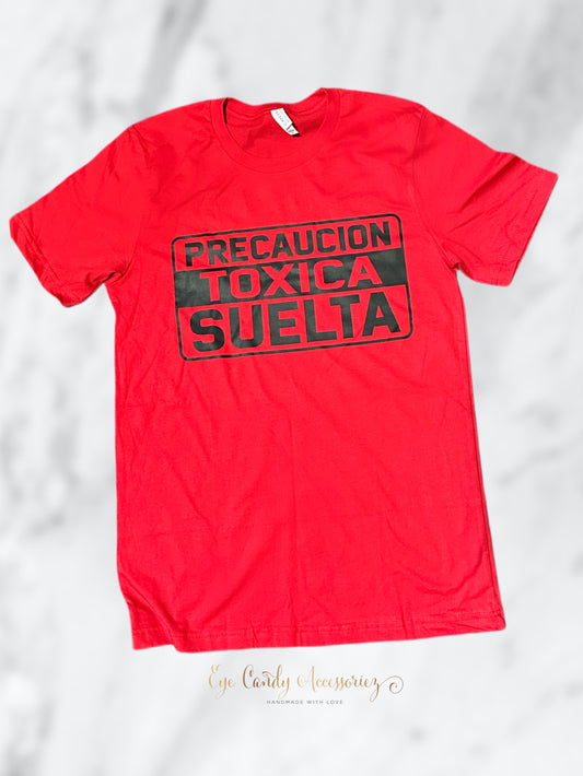 Precaucion Toxica Suelta- Screen Print T-Shirt & Sweater